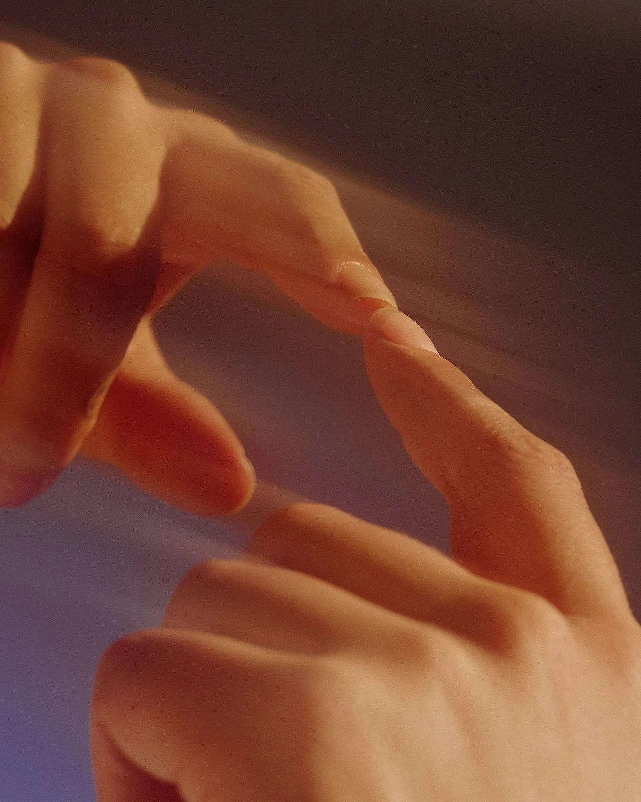 Two hands almost touching, premium care